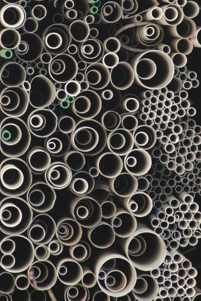 services-03 Abstract view of stacked pipes with circular repetition in West Java, Indonesia.